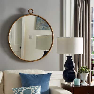 The Curated Nomad Maynard Antiqued Brass Round Wall Mirror with Decorative Ring