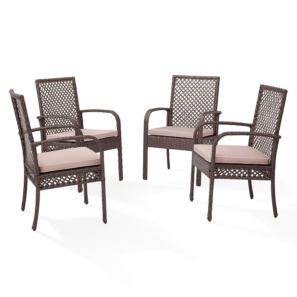 set of four wicker chairs