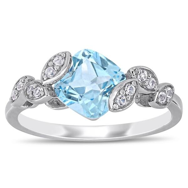 slide 1 of 5, Laura Ashley Sky Blue Topaz and Created White Sapphire Crossover Leaf Ring in Sterling Silver