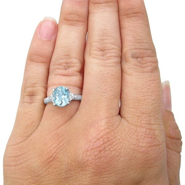 14k Yellow Gold Oval Aquamarine And Diamond Ring 14k Yellow Gold Oval Aquamarine And Diamond Ring