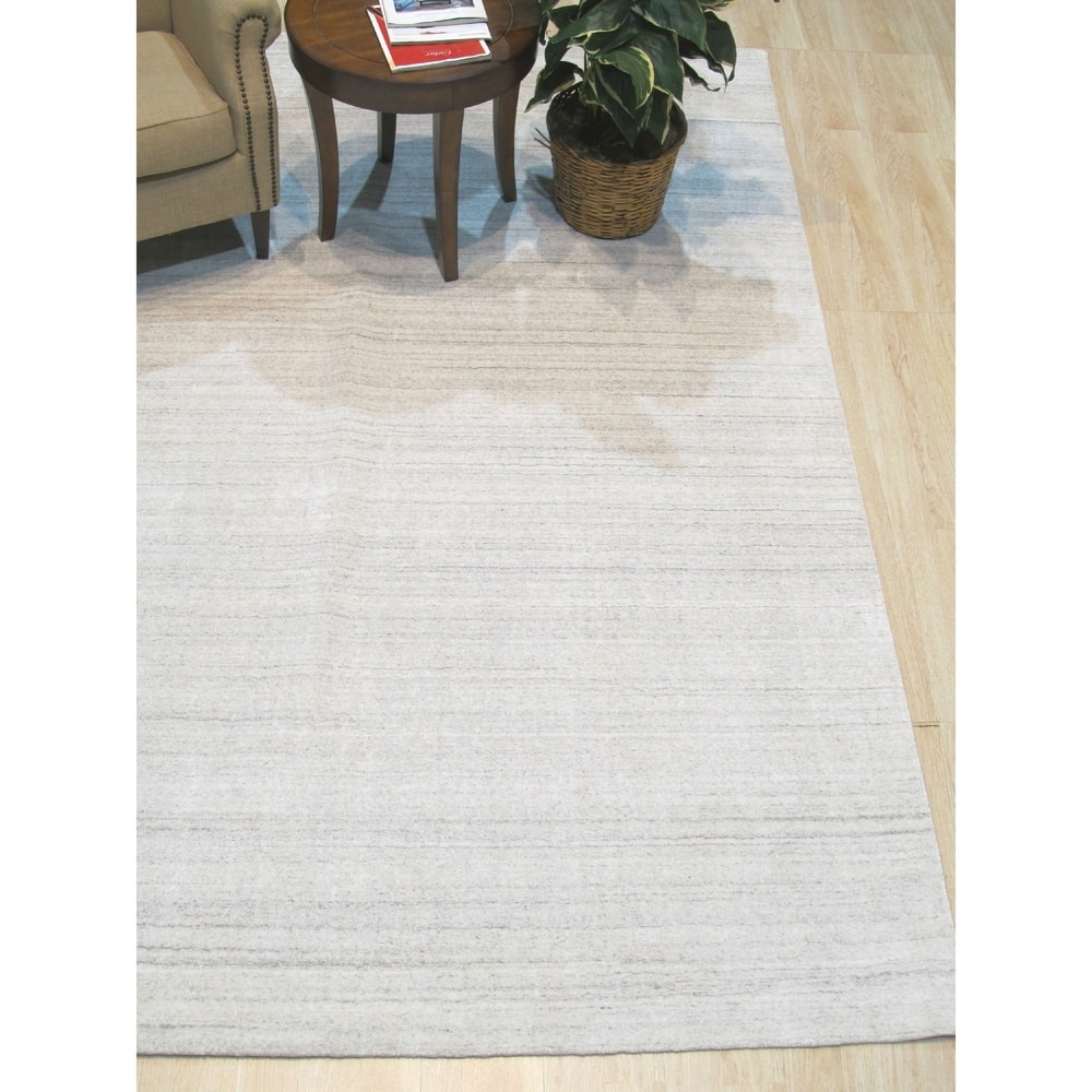 Ivory/White Solid Handmade Urban Rug