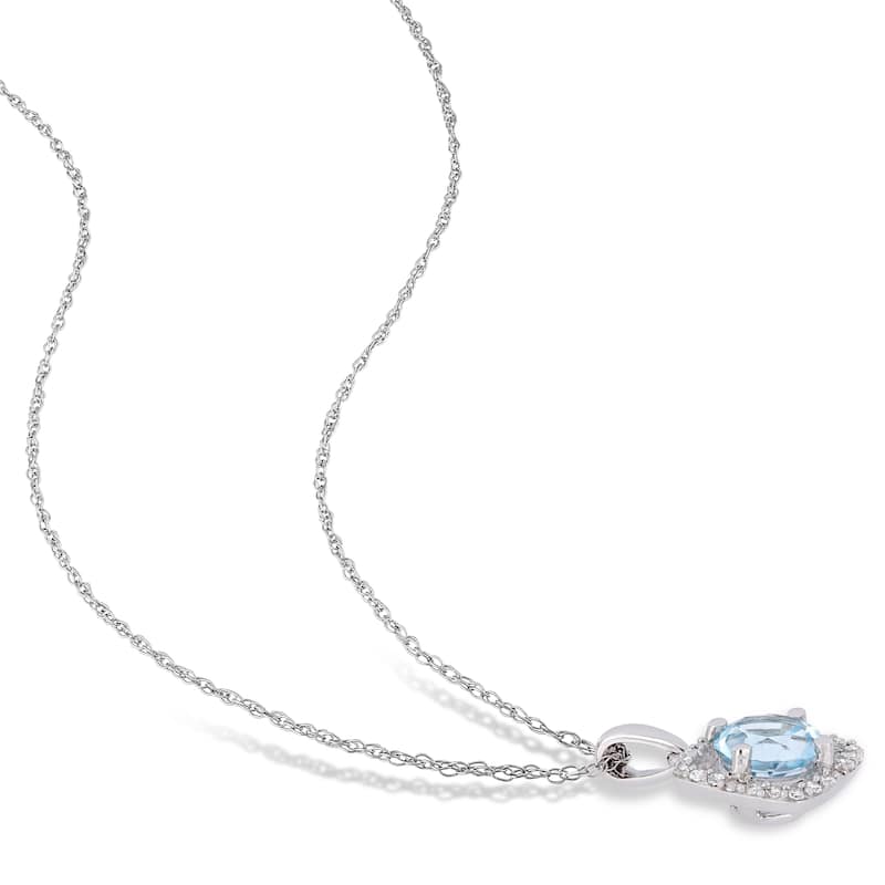 Miadora 10k White Gold Sky-Blue Topaz and 1/6ct TDW Diamond Floating Halo Jewelry Set