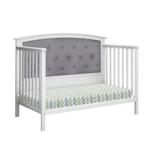 grey tufted crib