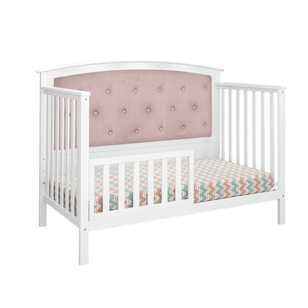 pink tufted crib