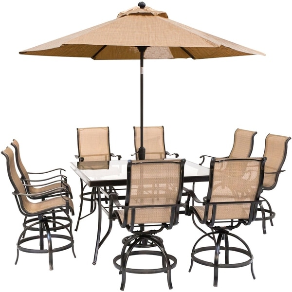 Hanover Monaco 9-Piece Counter-Height Outdoor Dining Set with 8 Sling Swivel Chairs, 60-In. Glass-Top Table, Umbrella and Stand