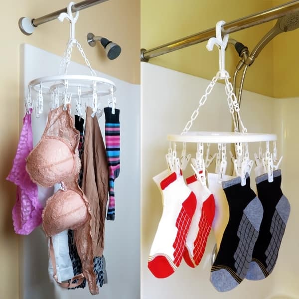 https://ak1.ostkcdn.com/images/products/28020661/Evelots-Clip-And-Drip-Clothes-Laundry-Drying-Hanger-With-16-Clips-Total-a7604f21-b0e8-4814-8905-1103cbef2ac1_600.jpg?impolicy=medium