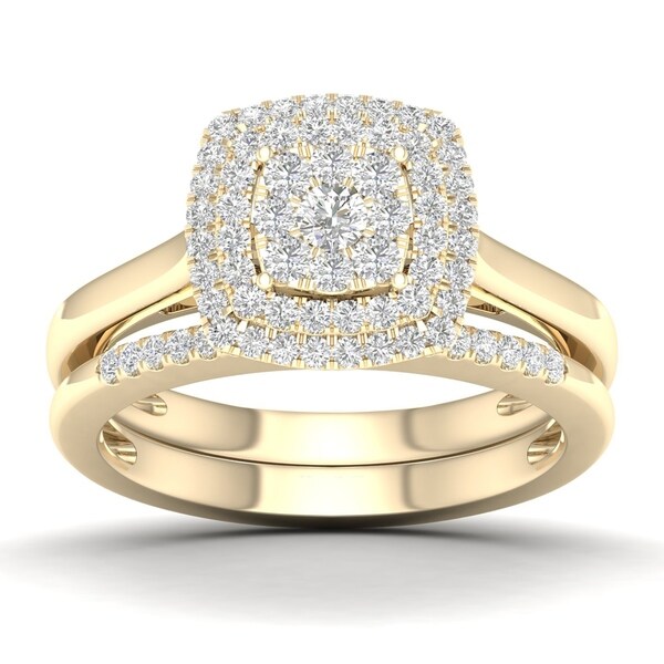 1/2 CT. T.W. Cushion Cluster Diamond Double Halo Bridal Set with two Pink Sapphire in 10K Yellow Gold. Opens flyout.