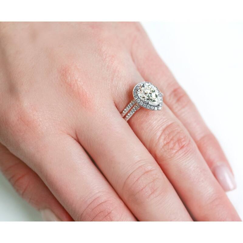 Annello by Kobelli 14k Gold 2 3/5ct TGW Charles and Colvard Forever One Pear Moissanite and Round Diamond Halo Bridal Rings Set