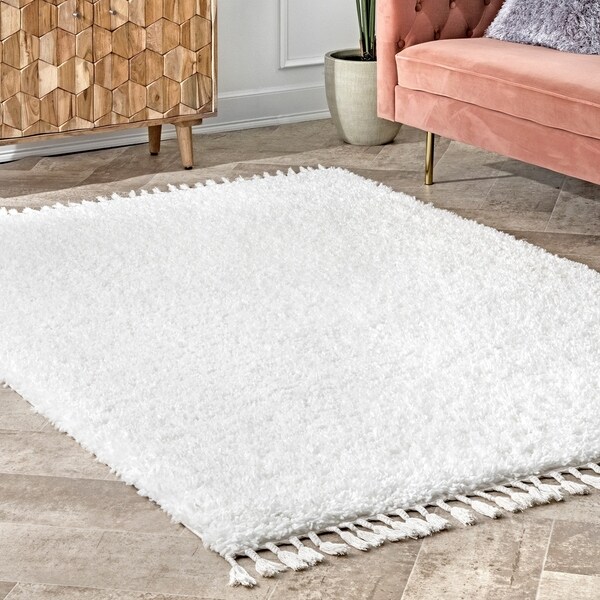 nuLOOM Casual Solid Shag Tassel Sauls Area Rug. Opens flyout.