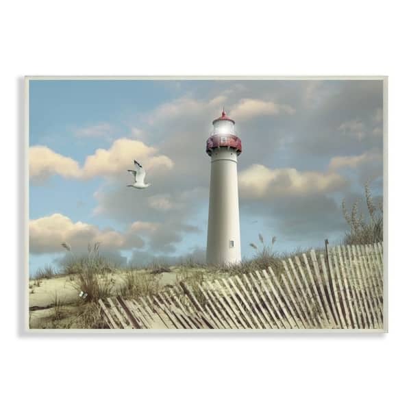 The Stupell Home Decor Cape May Sand Dune Fence Lighthouse Beach Scene With Seagull Wall Plaque Art 10x15 Proudly Made In Usa On 28173987 Sand Dune Fence Lighthouse Beach Scene