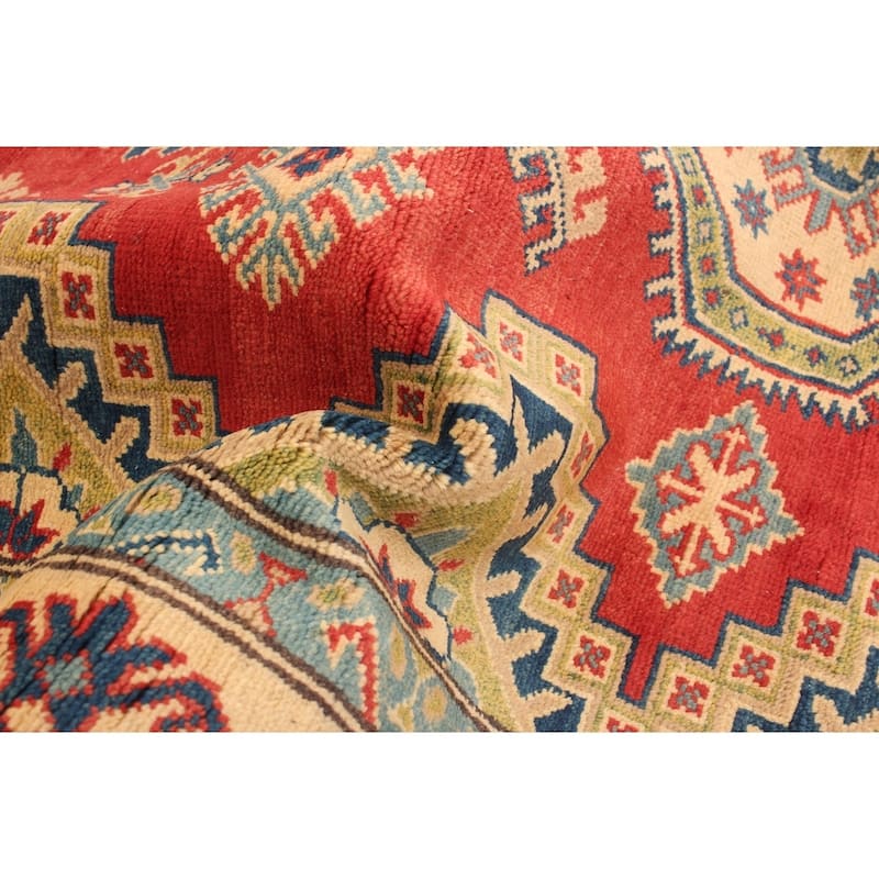 Hand-knotted Finest Gazni Copper Wool Rug - 4'11" x 6'5"/4'11 x 6'5
