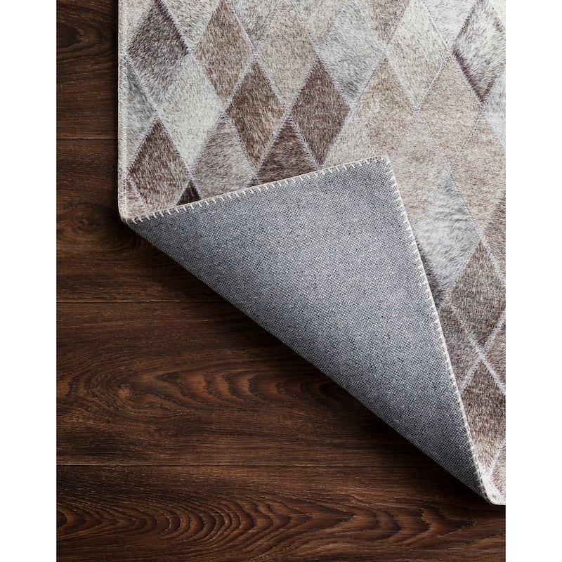 Alexander Home Davide Printed Faux Cowhide Area Rug