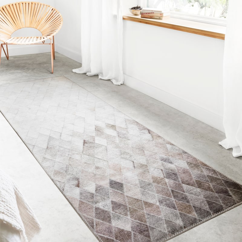 Alexander Home Davide Printed Faux Cowhide Area Rug