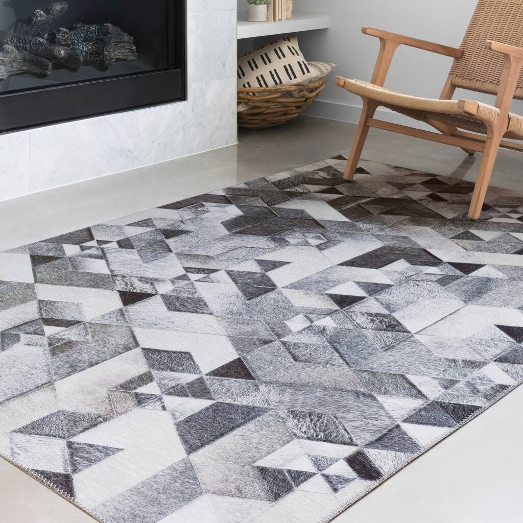 Alexander Home Davide Printed Faux Cowhide Area Rug