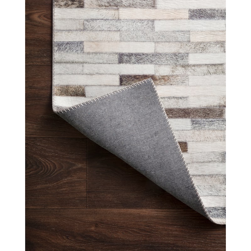 Alexander Home Davide Printed Faux Cowhide Area Rug