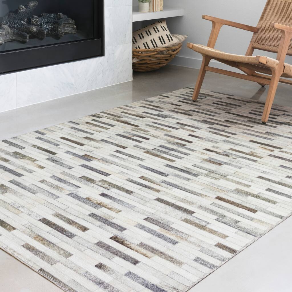Alexander Home Davide Printed Faux Cowhide Area Rug