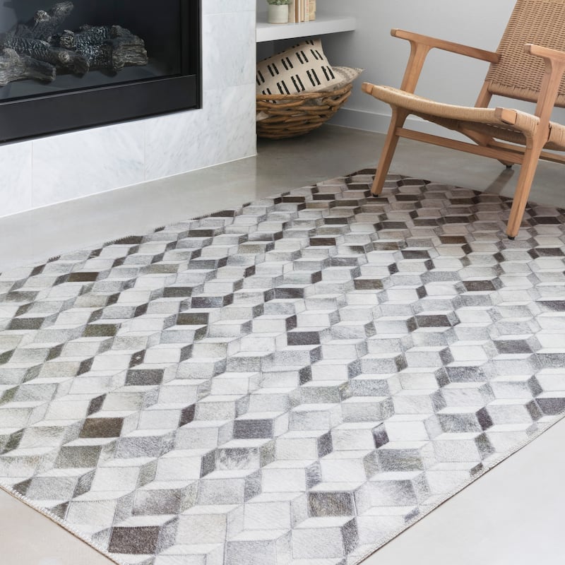 Alexander Home Davide Printed Faux Cowhide Area Rug