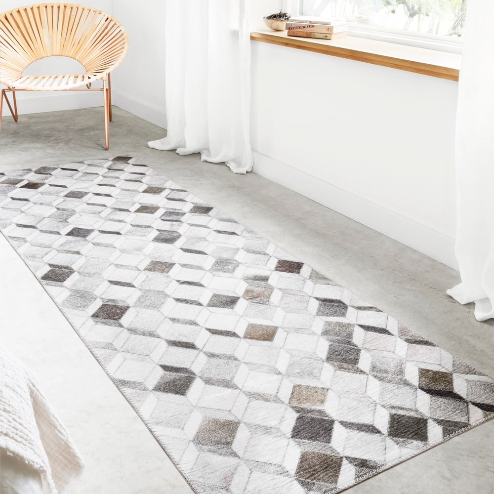 Alexander Home Davide Printed Faux Cowhide Area Rug