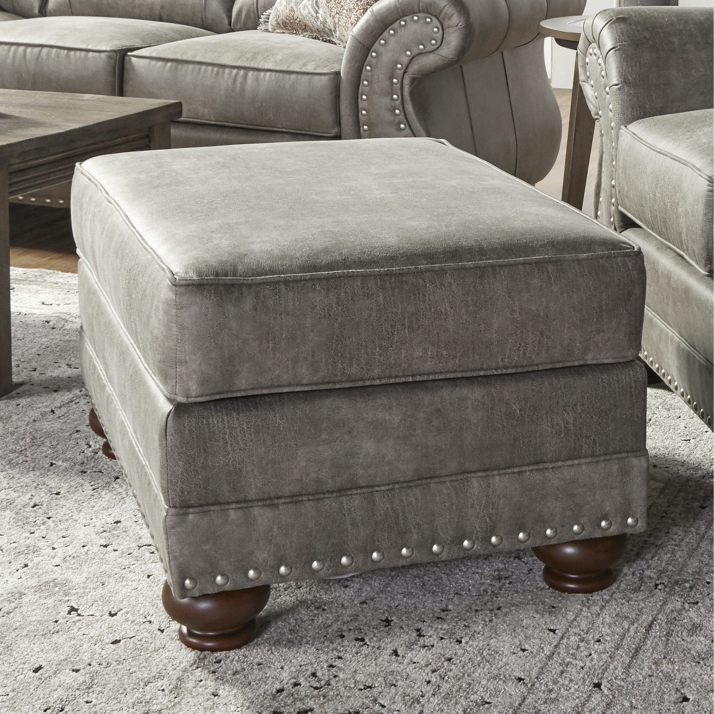 Roundhill Furniture Leinster Faux Leather Upholstered Nailhead Ottoman in Stone Gray