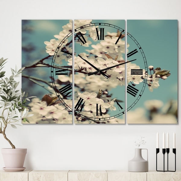 Designart 'White Spring Blossom' Oversized Cottage Wall Clock - 3 Panels - 36 in. wide x 28 in. high - 3 Panels