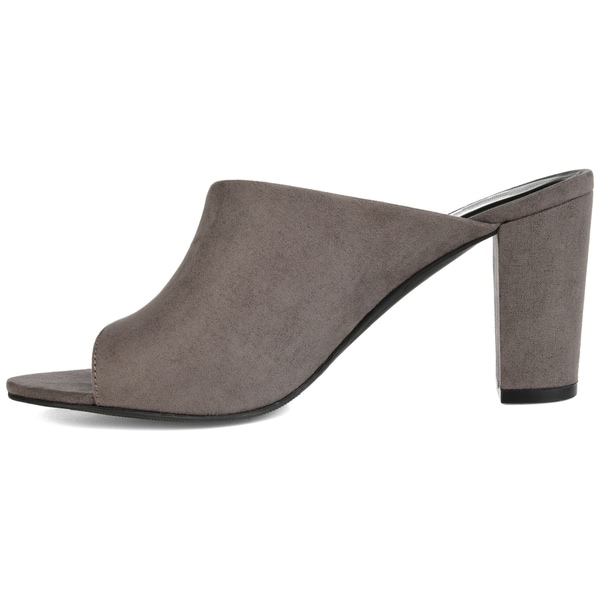 grey clogs and mules