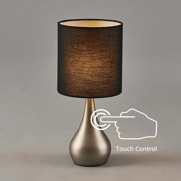 https://ak1.ostkcdn.com/images/products/28386436/Versanora-Sarah-Table-Lamp-with-Touch-Switch-Black-Fabric-Shade-Brushed-Steel-Finish-15-H-N-A-a8367f20-0e06-47b9-9918-a3129d4bec9e_600.jpg?impolicy=medium