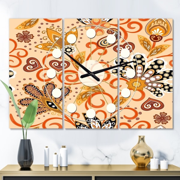 Designart 'Retro Indian Floral Batik III' Oversized Mid-Century wall clock - 3 Panels - 36 in. wide x 28 in. high - 3 Panels. Opens flyout.