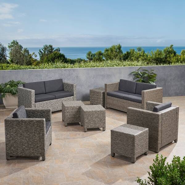 Puerta Outdoor 6 Seater Wicker Chat Set with Side Tables by Christopher