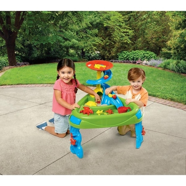 sand and water table with fish pond