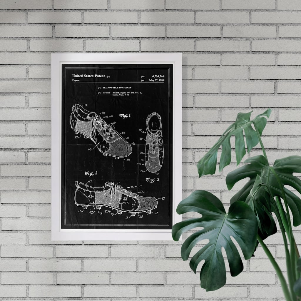 Wynwood Studio 'Training shoe for soccer 1980' Sports and Teams Framed Wall Art Print - Black, White