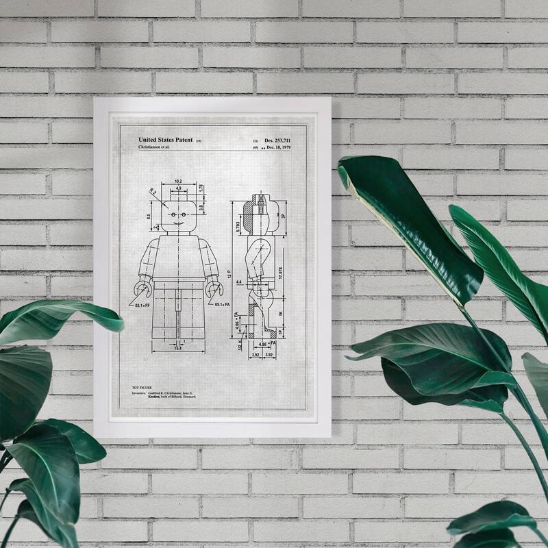 Wynwood Studio 'Lego Toy Figure, 1979 - Gray' Symbols and Objects Framed Wall Art Print - Black, Gray