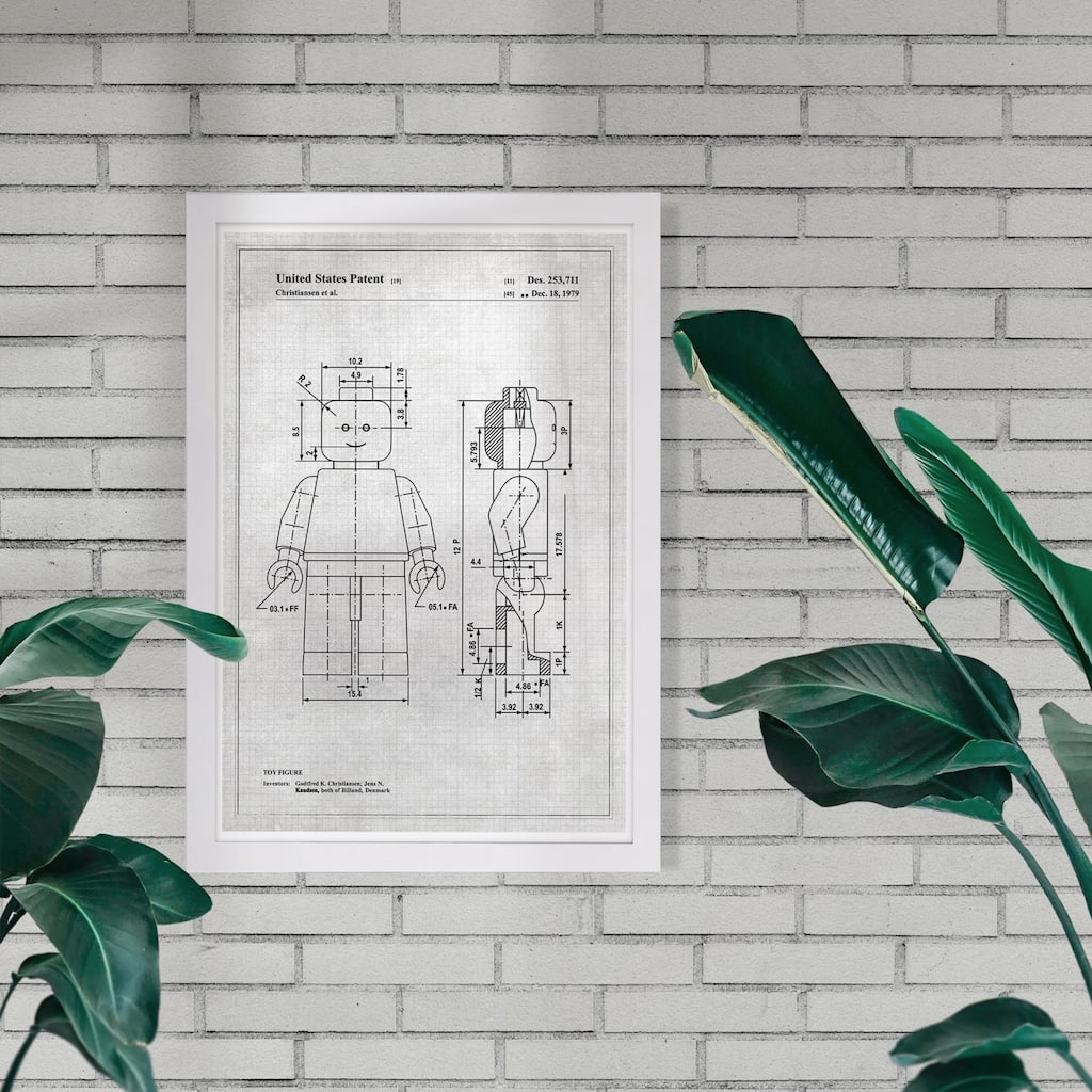Wynwood Studio 'Lego Toy Figure, 1979 - Gray' Symbols and Objects Framed Wall Art Print - Black, Gray
