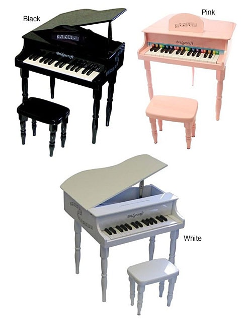 child's baby grand piano white