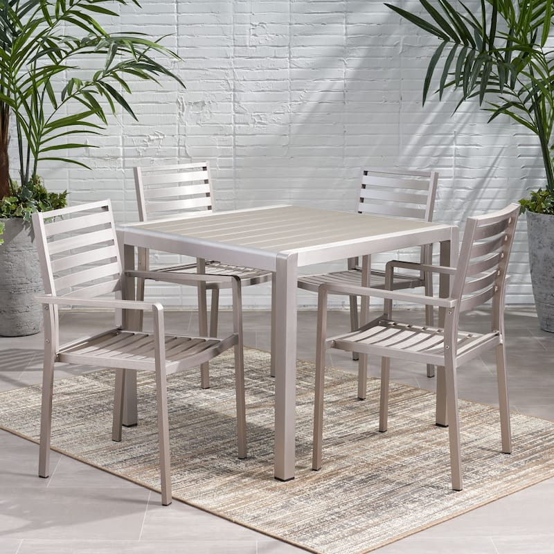 Cape Coral Outdoor Modern 4 Seater Aluminum Dining Set with Faux Wood Table Top by Christopher Knight Home
