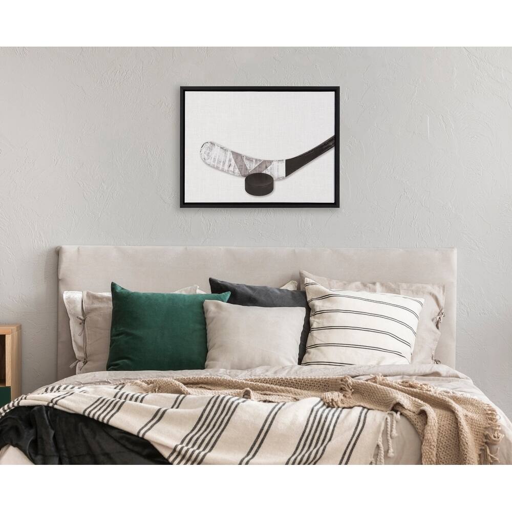 DesignOvation Sylvie Hockey Stick And Puck Portrait Framed Canvas