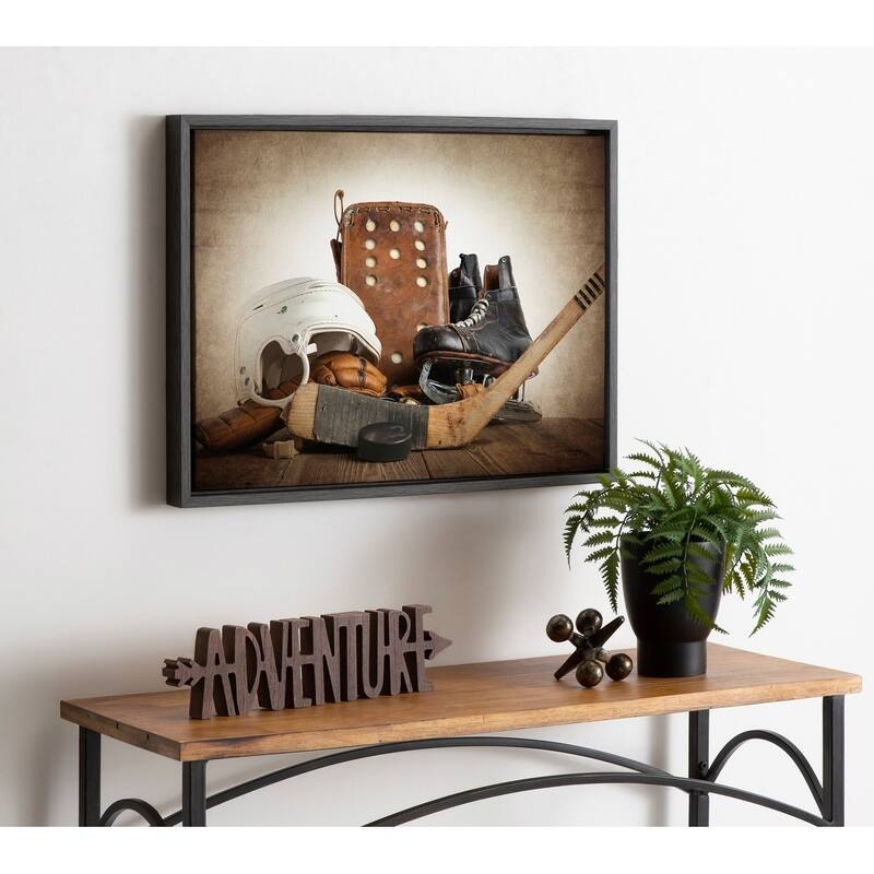 DesignOvation Sylvie Hockey Gear Framed Canvas by Shawn St. Peter