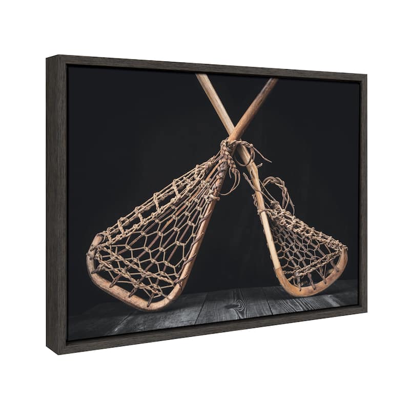 DesignOvation Sylvie Lacrosse Sticks Framed Canvas by Shawn St. Peter