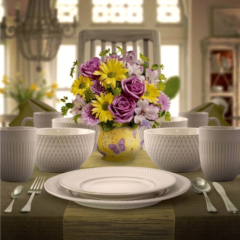 Elama Market Finds 16 Piece Stoneware Dinnerware Set in Embossed White