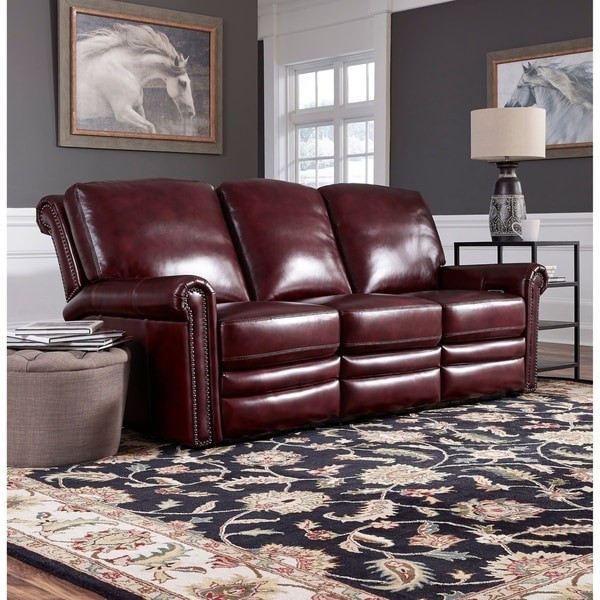 red leather reclining sofa