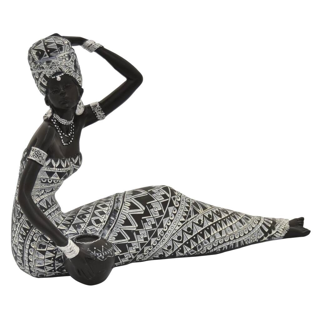 African Figurine in Black Resin / Magnesium 12in L x 5in W x 8in H