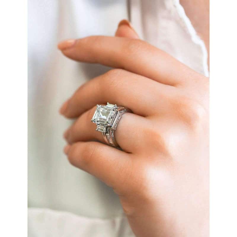 Annello by Kobelli Echo 14k White Gold 5.90 Carats TGW 3-Stone Emerald Moissanite and Baguette Diamond Bridal Rings Set.