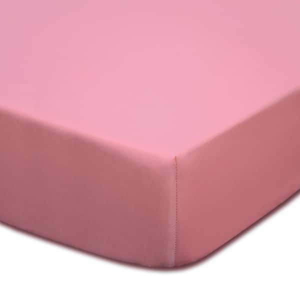 slide 1 of 1, The Peanut Shell Gia Solid Coral Cotton Fitted Crib Sheet