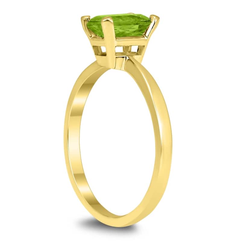 Emerald Shaped 7X5MM Peridot Solitaire Ring in 10K Yellow Gold