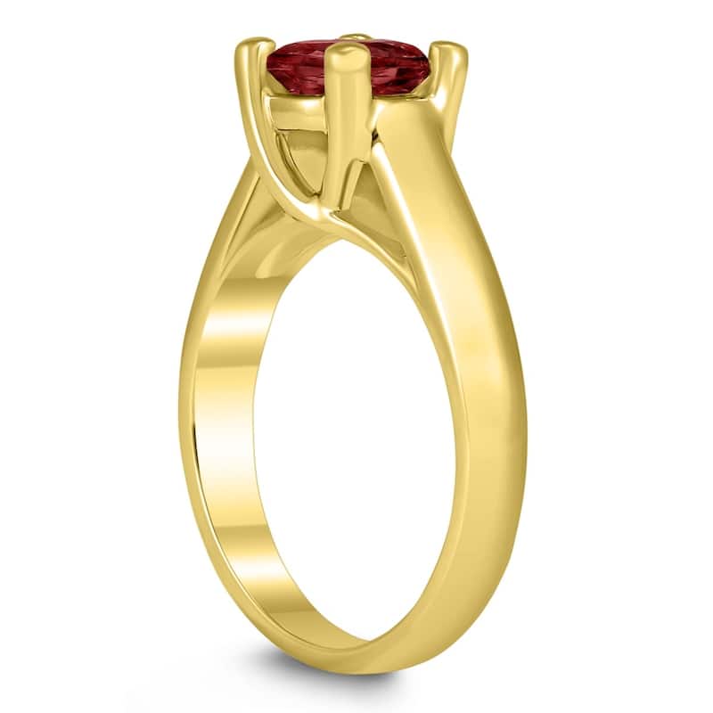 Round 7MM Garnet Cathedral Solitaire Ring in 10K Yellow Gold