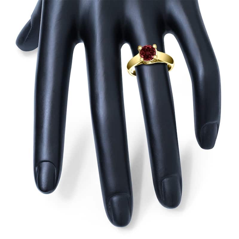 Round 7MM Garnet Cathedral Solitaire Ring in 10K Yellow Gold
