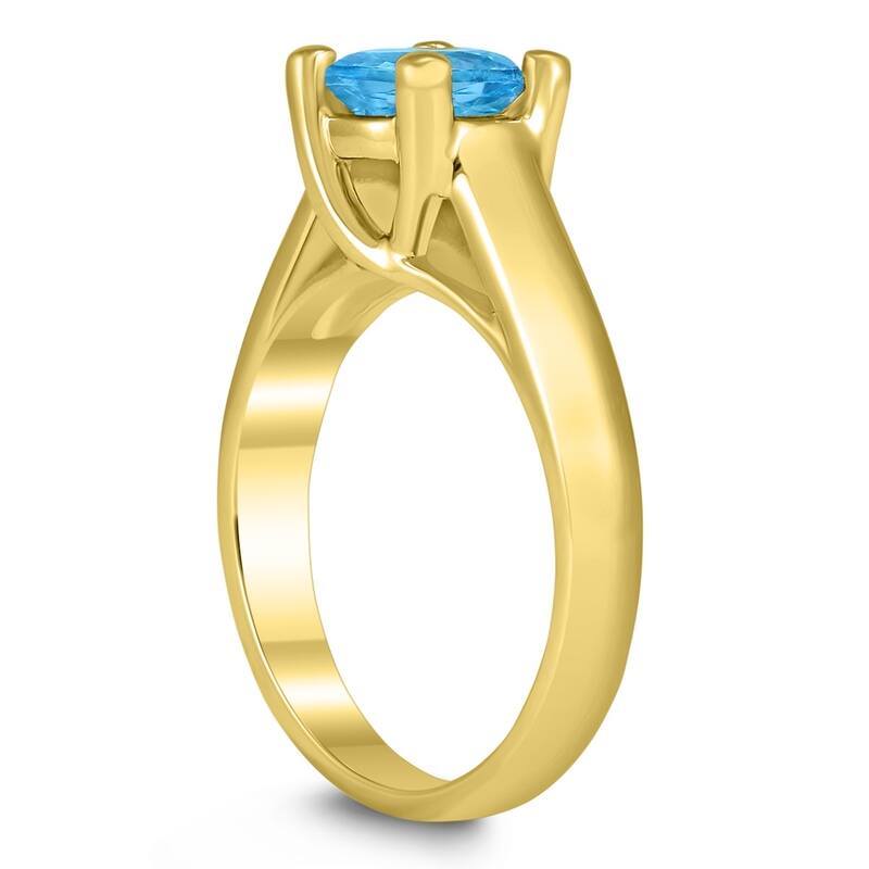 Round 7MM Blue Topaz Cathedral Solitaire Ring in 10K Yellow Gold