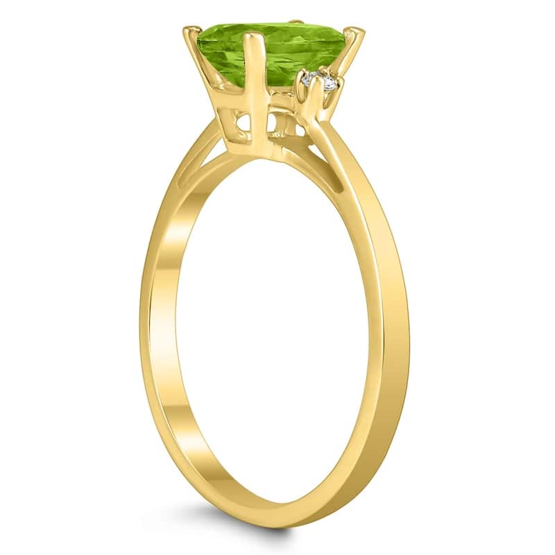 Emerald Cut 7X5MM Peridot and Diamond Three Stone Ring in 10K Yellow Gold