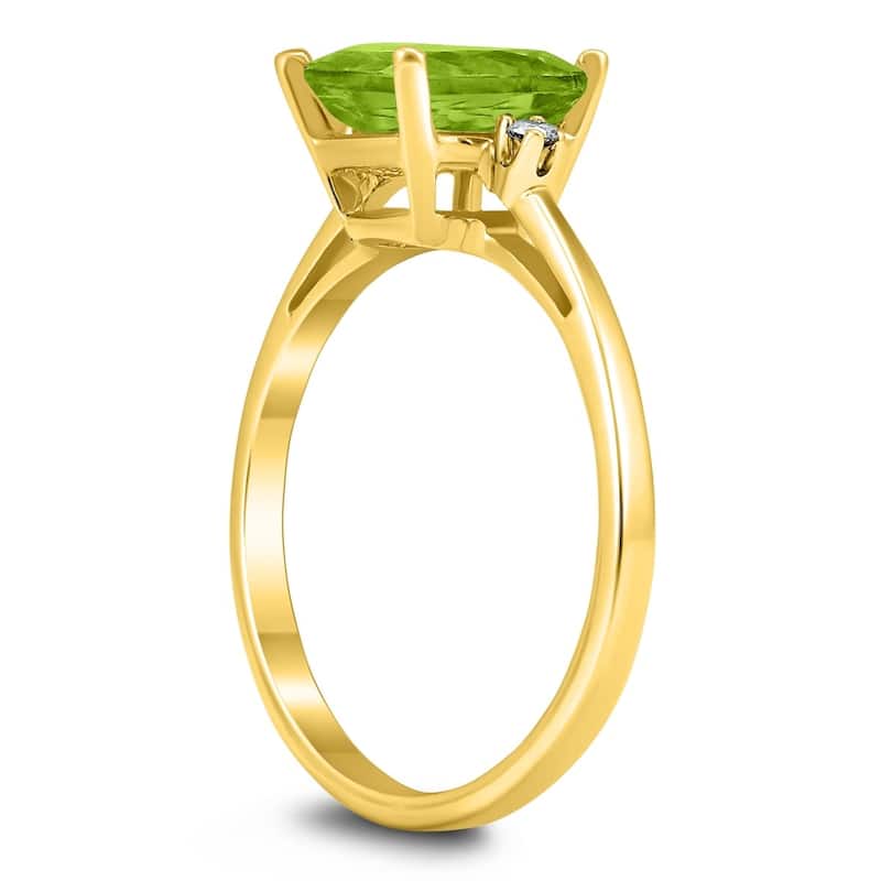 Emerald Cut 8X6MM Peridot and Diamond Three Stone Ring in 10K Yellow Gold