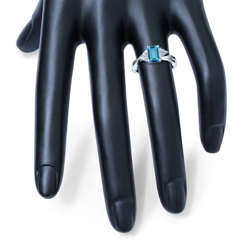 7X5MM Blue Topaz and Diamond Twist Ring in 10K White Gold