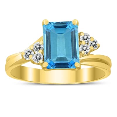 8X6MM Blue Topaz and Diamond Twist Ring in 10K Yellow Gold